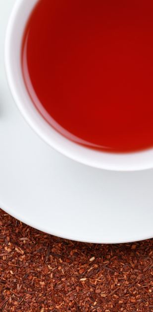 De uitgestrekte Rooibosvelden in de rode aarde van de Cederberg